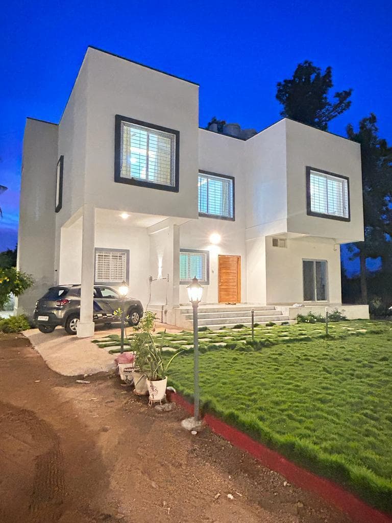 Farmhouse exterior at twilight